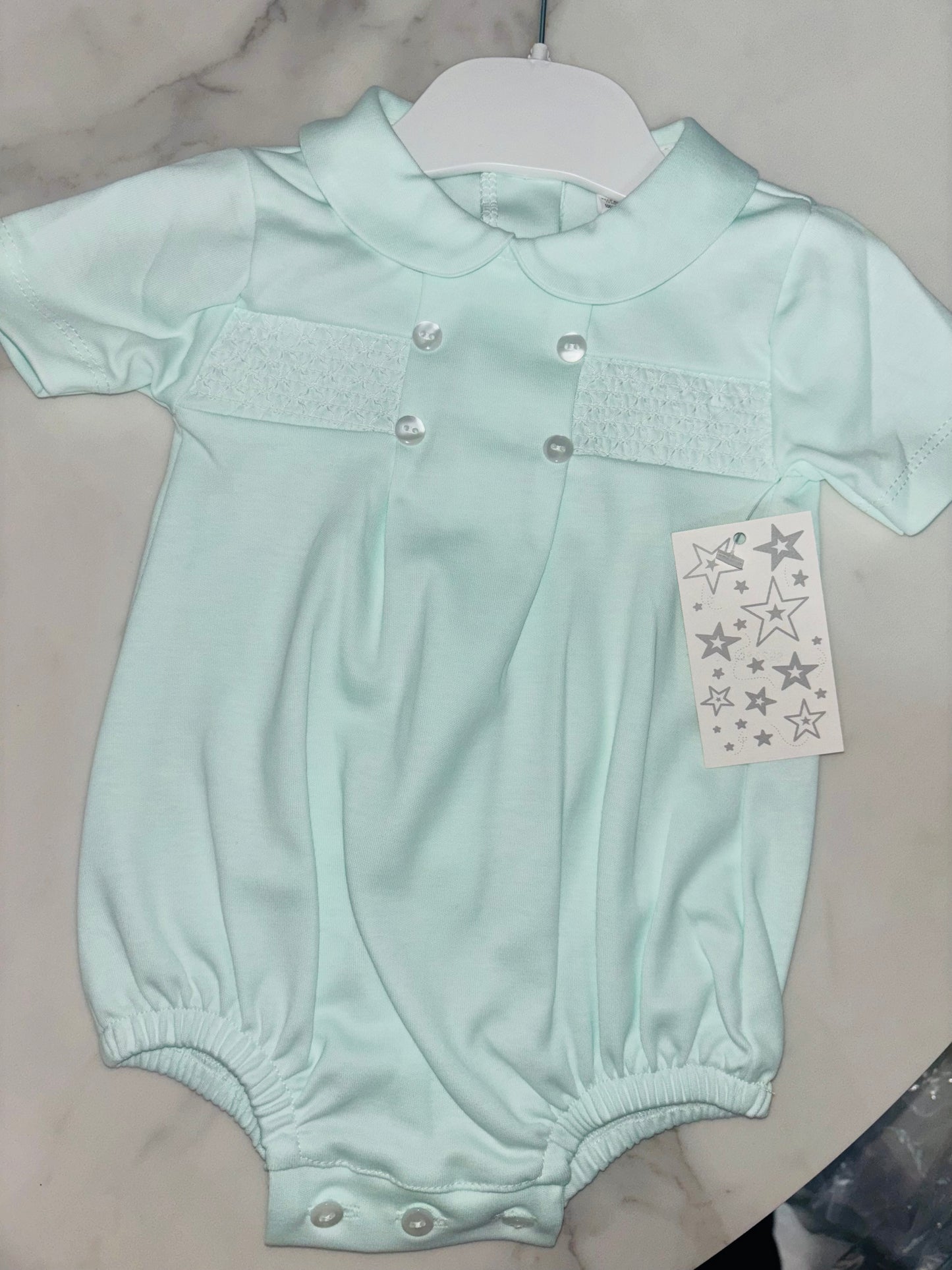 Round Collar Romper with Skock Detailing