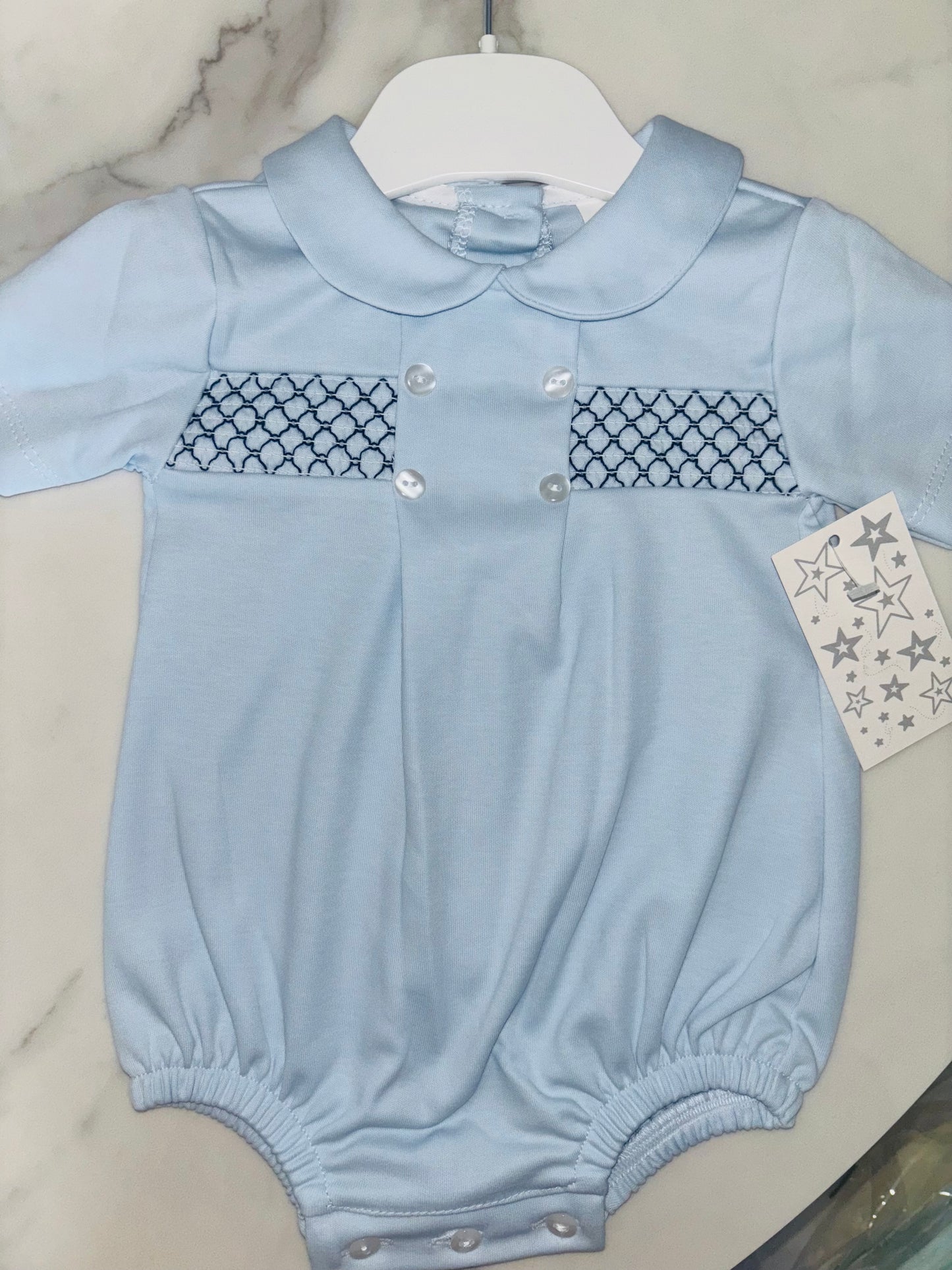 Round Collar Romper with Skock Detailing