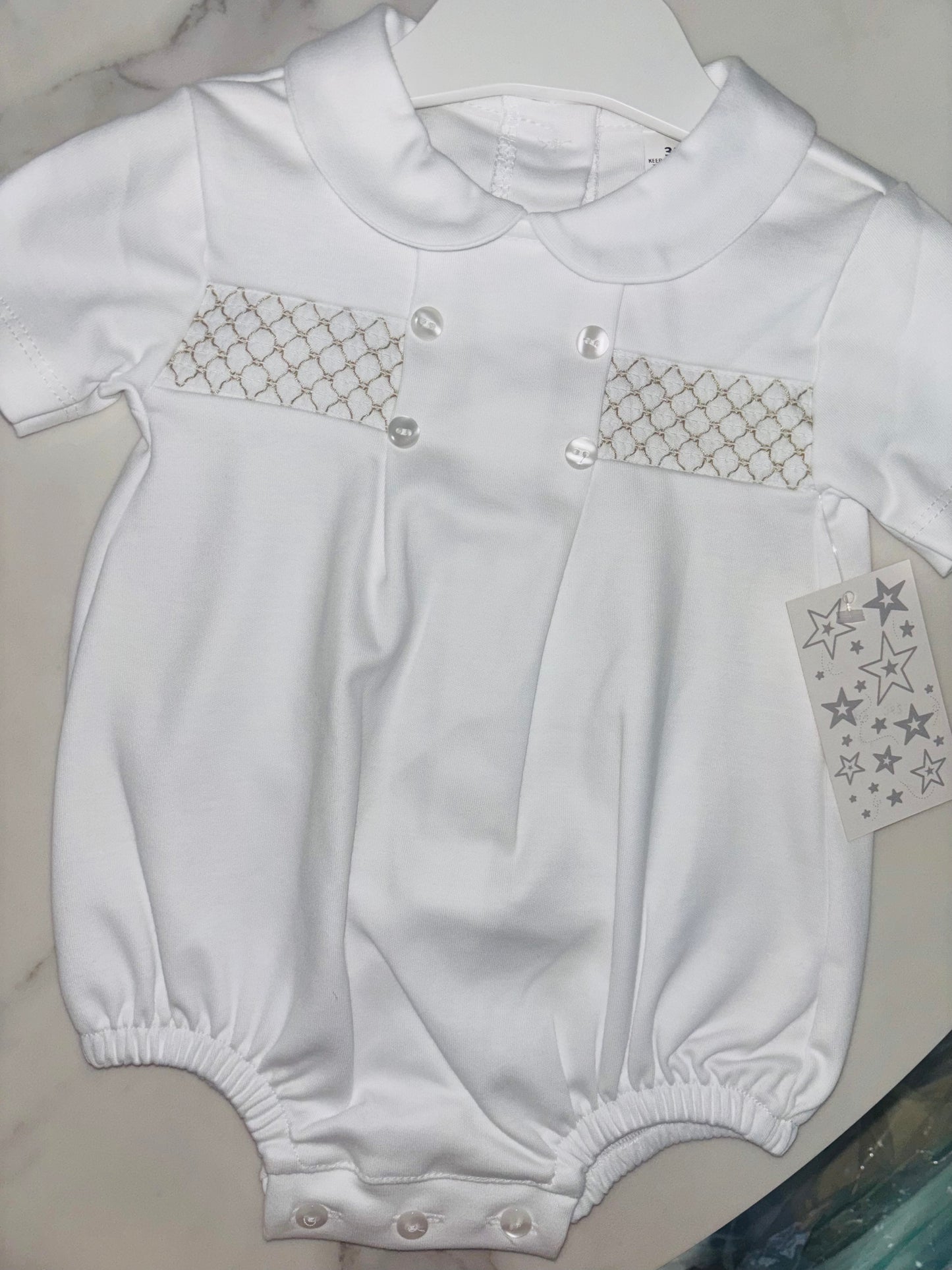 Round Collar Romper with Skock Detailing